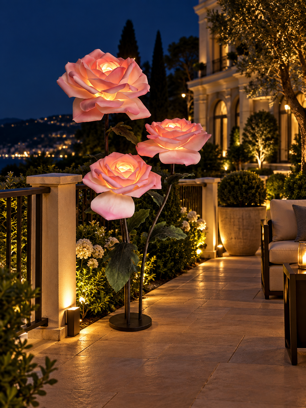 Rose Trio outdoor illuminated flower lamp at night, illustrative setting