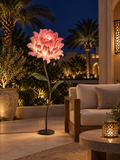 Dahlia outdoor illuminated flower lamp at night, illustrative setting