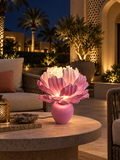 Peony outdoor illuminated flower lamp at night, illustrative setting