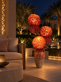 Hydrangea Trio outdoor illuminated flower lamp at night, illustrative setting